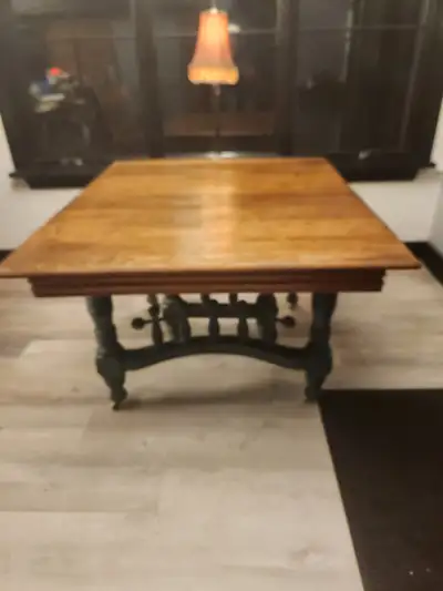 Antique farm house table Decorative spindles 44" wide 52" long with two 13" leaves To extend 30" tal...