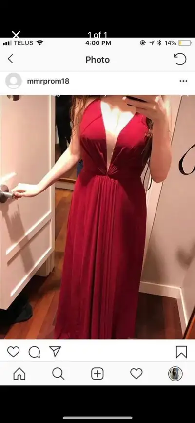 Slit in front. Lace back Wore once From Laura’s