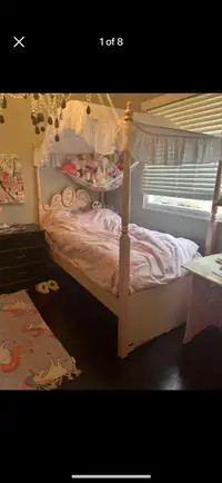 Canopy girls bed with new mattress 