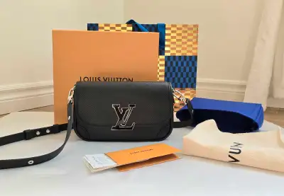 Like a Brand New Bag. Barely used it!! I'm not interested in getting an authenticity card. The bag i...