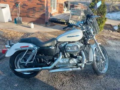 Hey I'm selling a 2005 Harley Davidson Sportster XL1200c custom. Nice clean bike rode as a daily for...
