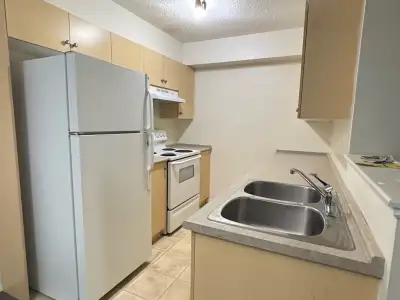 2 bed condo Bridlewood SW with all utilities & parking
