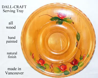 The food serving tray surface, top, is divided into 3 concentric rings, 3 serving areas The center d...