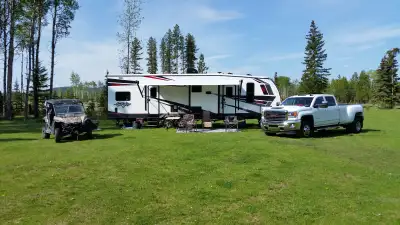 2019 TOY HAULER TRAILER HAS A 12 FOOT GARAGE WITH BUNK BEDS AND TIE DOWNS AND A 2 PIECE BATHROOM. AL...