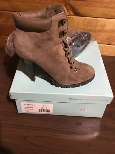 Step out in style with these Jessica Simpson genuine suede booties, perfect for adding a touch of el...