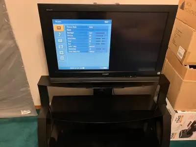 Sony Bravia 37” LCD TV / Stand Tv and stand in great shape, Comes with working remote, Stand has 3 t...