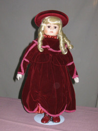 19 inch Porcelain Victorian Doll in Burgundy Cape  $55.