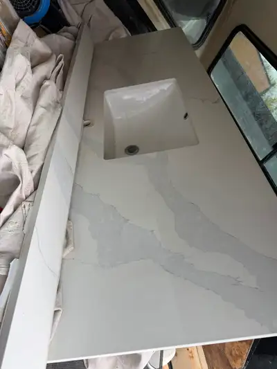 62.5 x 23in Counter top, back backsplash and side backsplash in really good condition, they’ll just...
