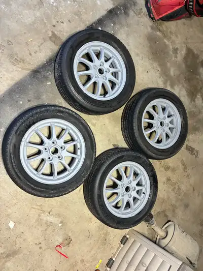 6jj Solid rims and tires, they are primed not painted but ready to go and be painted. Tires are like...