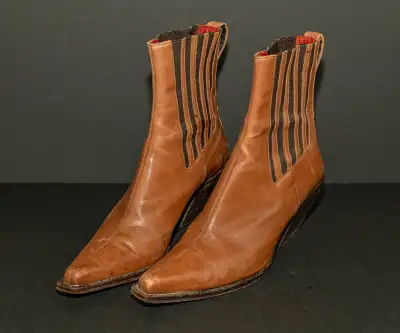 Tan Leather short cowboy style like boots. Donald J. Pliner. Made in the Mountains of Italy.