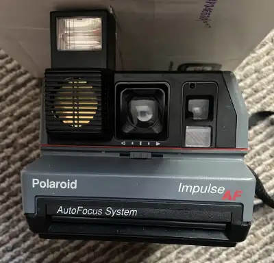 Vintage Polaroid Impulse Camera, View more