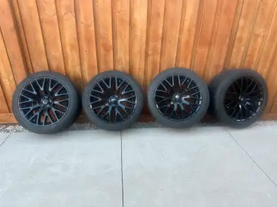 Selling a set of four OEM Ford Mustang GT Performance Pack Wheels with winter tires Staggered setup...