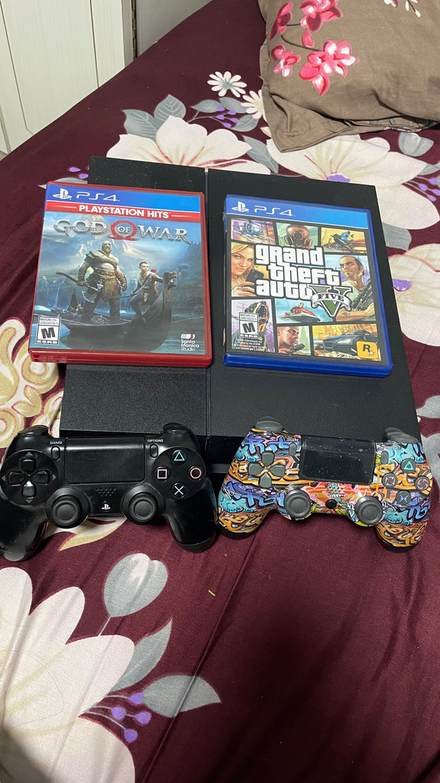 PS 4 500 GB with 2 remotes and 2 games ( GTA 5) ( GOD OF WAR )  in Sony Playstation 4 in Hamilton - Image 2