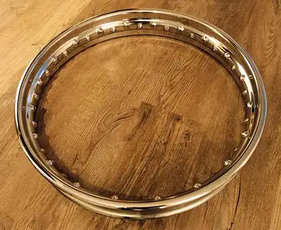 New old stock Dunlop 18 inch, 40 hole rim. Made in England, WM3. $300.