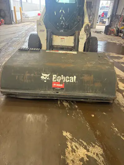 USED BOBCAT PICKUP SWEEPER in good condition. Sweeps forward and reverse. Hoses in good shape no lea...