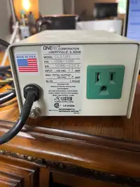 One/Ac Power surge and line conditoner