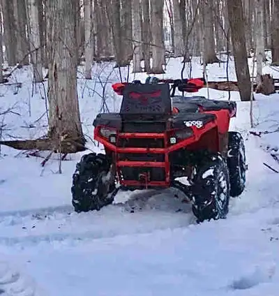 2014 Polaris Spirtsman 570. Great quad with a lot of modifications, I bought to plow snow last year...