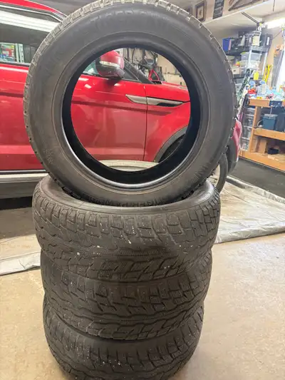 Less than 800 km. These Uniroyal Tiger Paw Ice & Snow are nearly new. Tread depth shows 11/32 on all...