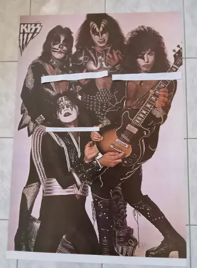 MINT IS JUST LIKE NEW!! KISS HOLDING A GUITAR 21 X 30 3/4 INCHES!! VERY RARE!! THE NON-STICK TEMPORA...