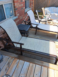 2 outdoor lounge chairs