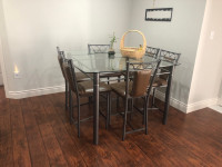 Steel dinning table with 6 high rise chairs