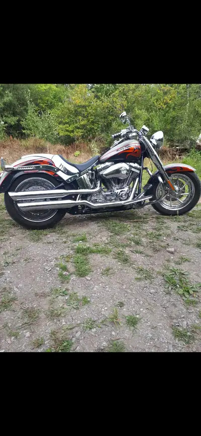 Looking to sell/trade a very low km super rare Harley CVO FATBOY Possible even trade for a corvette...