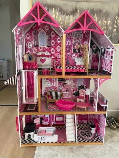 Like new kidkraft dollhouse. 49” by 33”-13” deep. Retails over $300 Comes with all the furniture ins...
