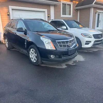 Cadillac SRX Premium 2012. Traction intégrale. Essence ordinaire. Moteur 3,6 l. (plus fiable que le...
