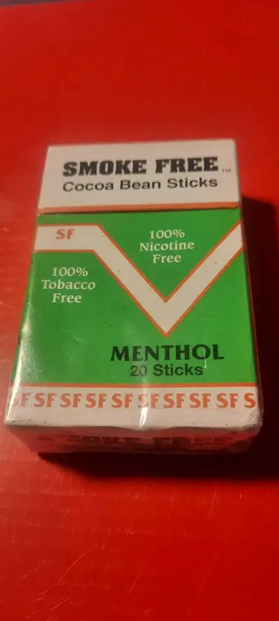 A pack of 20 Smoke Free Cocoa Bean Sticks Menthol cigarettes. 100% tobacco free and 100% nicotine fr...