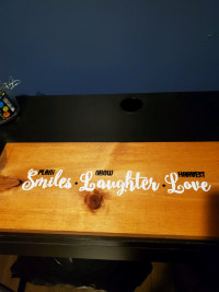 Wooden sign    Homemade
SMILE    LAUGHTER  LOVE