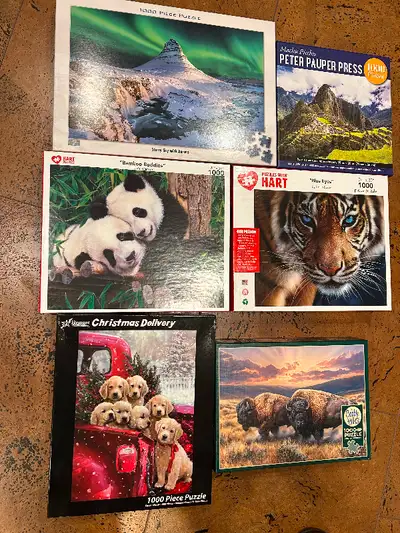 Selection of 1000 piece jigsaw puzzles. No missing pieces. $7.00 each or 8 for $50.