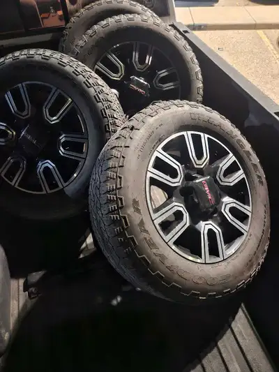 AT4 8 bolt Duramax wheels and tires Rims look New 2 tires are almost done 2 tires are still around 5...