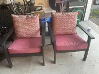 Pair of patio chairs with cushions 