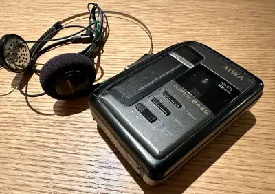 Plays but is slow. Fast forward and rewind works but also a little slow. Headphones is missing one f...