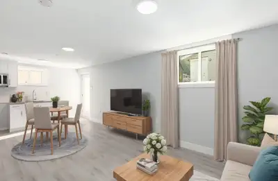 This bright and spacious south-facing one-bedroom suite with open living room and kitchen is ideally...