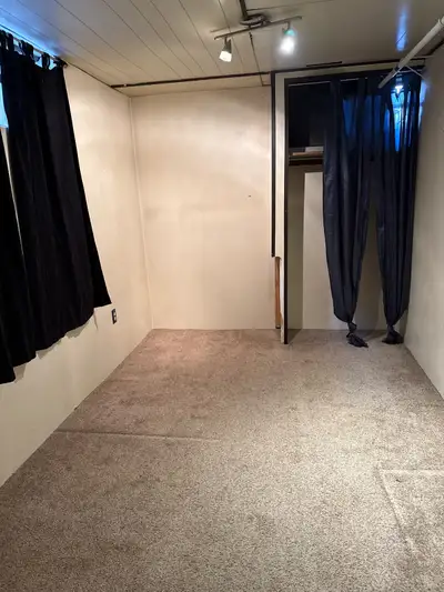 This cosy little basement bedroom and den is ready for you . There is no bathroom in the basement. T...