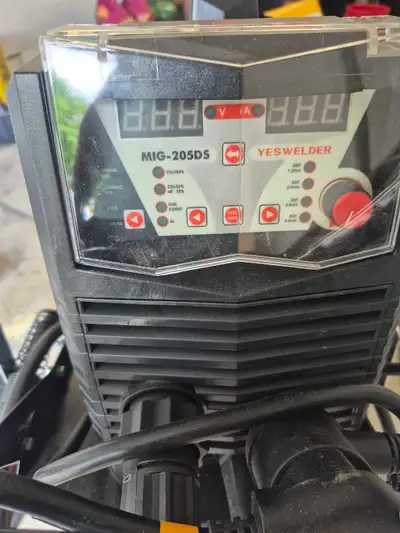 Selling my yes welder 205DS Welder does mig,tig and stick Comes with cart,bottle,welding helmet,2 10...