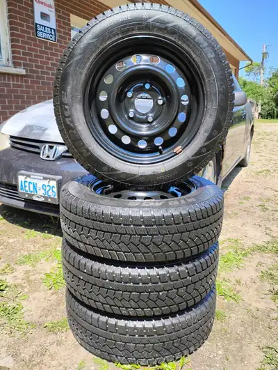Used for one season like new snow tires mounted on late model Honda civic rims 195/65/15 MIRAGE MR-W...