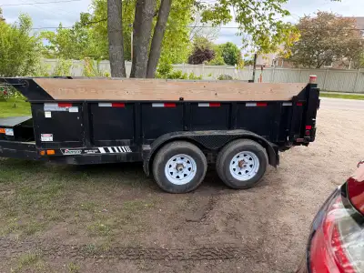 2021 Canadian Trailer it’s a 6 x 12 5 ton dump trailer with the aluminum ramps under the back of the...