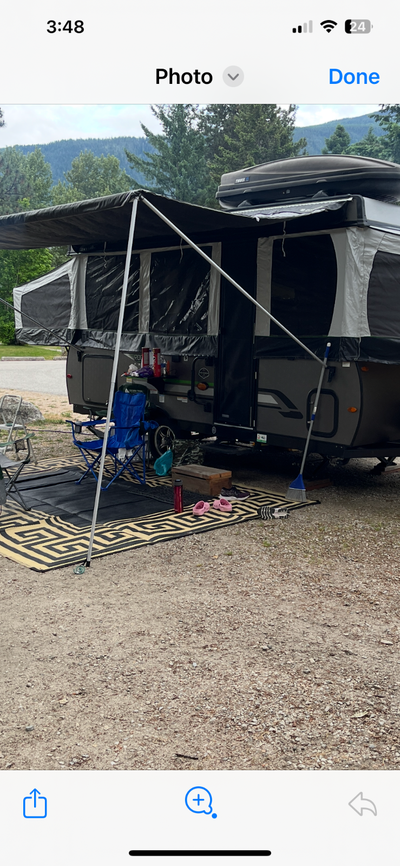 Immaculate (like new,hardly used) 27 feet open,3 slides,large slide table/bed,air conditioner (added...