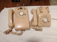 Vintage 1960s pink table and wall rotary phones great condition