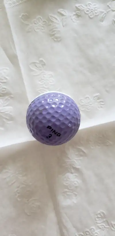PING Lavender - White golf ball. Lake Chelan logo