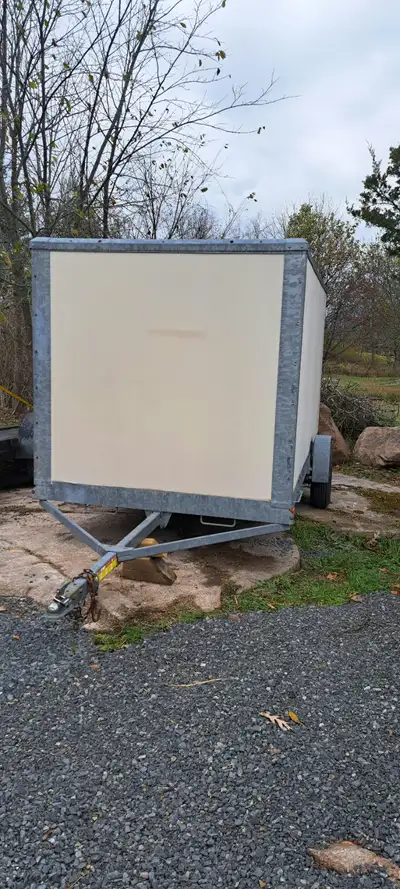 In great conditions Located in gananoque 2500.$ 10x5x5 Galvanized Combo Barn and loading doors