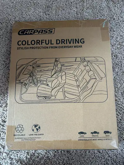A CARPASS Black Diamond Steering Wheel Cover. Has a nice design, condition is NEW.