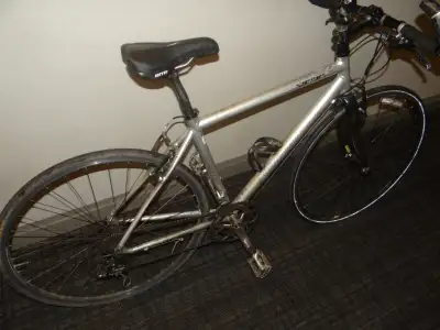 Specialized Sirrus Comp Road bike. Good condition. Free combo lock. Works well Some new parts. 700C...