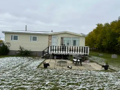 Double wide (26x40) house trailer plus an addition (26'8x11'). 3 bedroom, 1.5 bathroom Great starter...