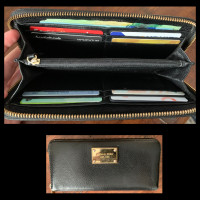 MK Near-New Handsome Black Leather Zippered Wallet .