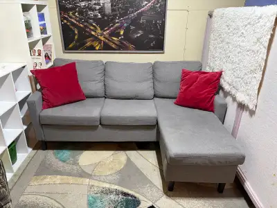 Grey sectional couch in good condition , View more