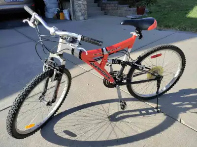 Dual/ full suspension, 21-speed, Supercycle red mountain bike Medium frame: adjustable seat (height...