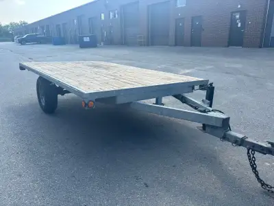 Home built 12ft x 88” wide flat bed Fully galvanized frame with PT board Shocks to give it stability...